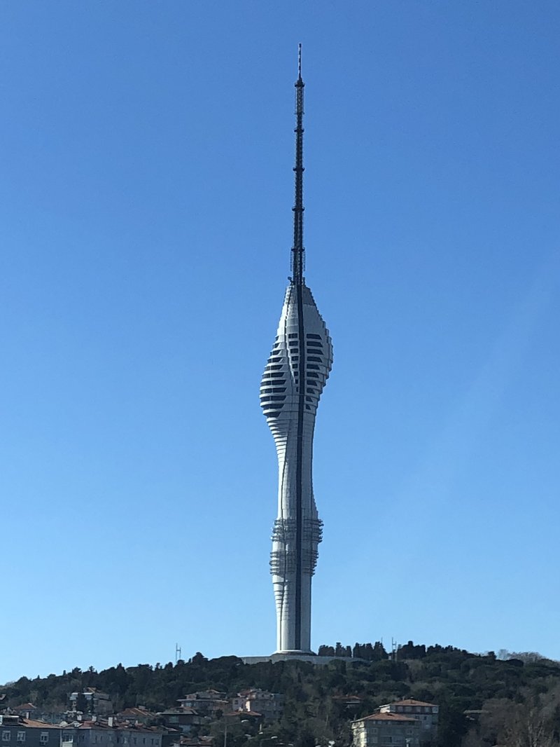 Çamlıca Tower's tulip-inspired spire against a clear sky over Istanbul