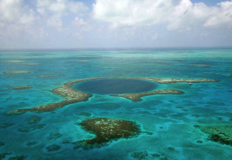 Aerial view of the Great Blue Hole marine sinkhole off the coast of Belize