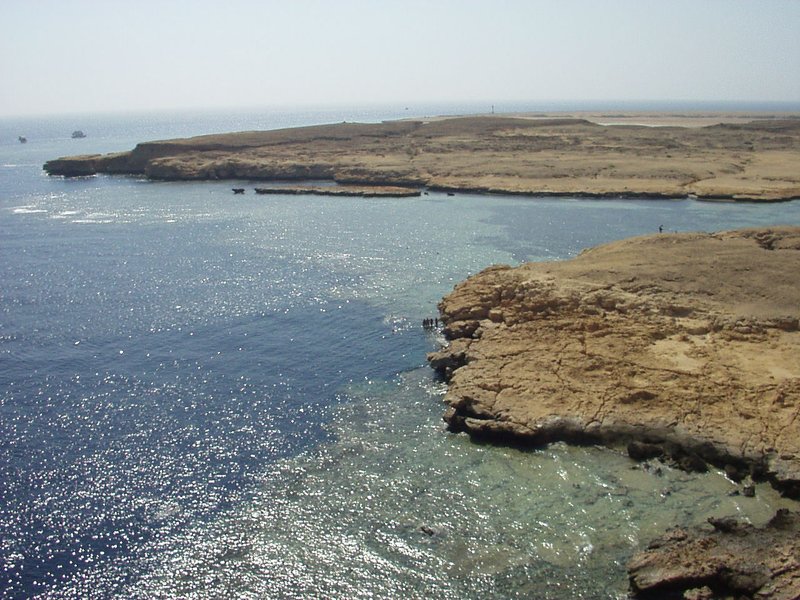 Rocky headland and reef flat at Ras Mohammed National Park where the shallow reef drops into deep Red Sea water
