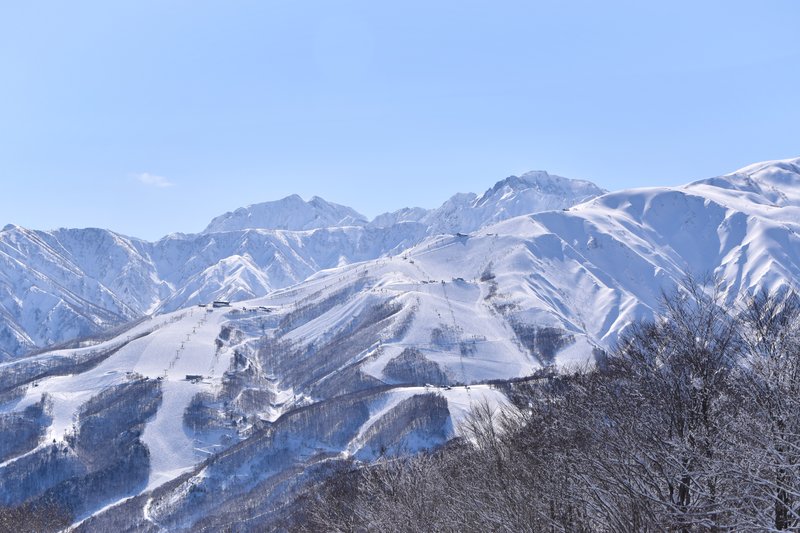 Snow-covered ski runs across the Hakuba Valley peaks in Nagano's Northern Alps