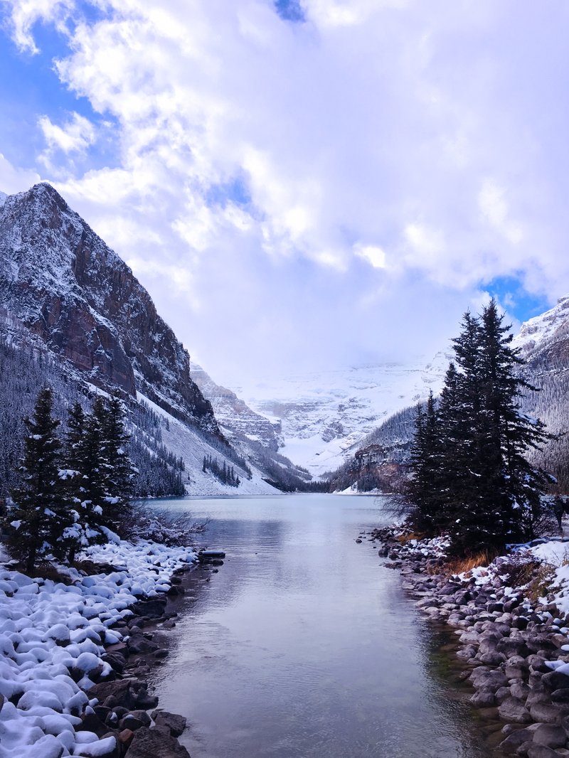 Lake Louise's turquoise water framed by glaciers and peaks in Banff National Park