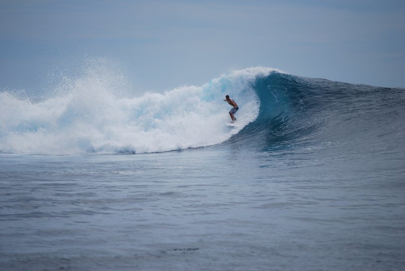 Surfers exploring the Mentawai Islands, Indonesia