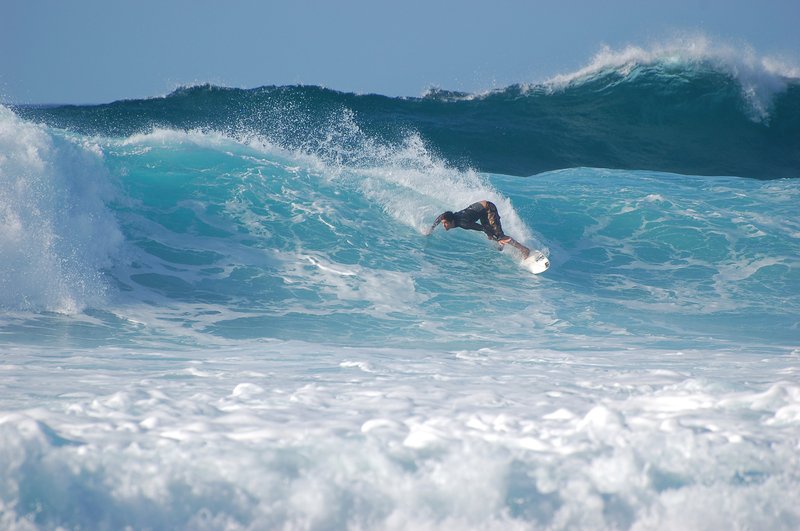Surfer at Banzai Pipeline, North Shore, Oahu