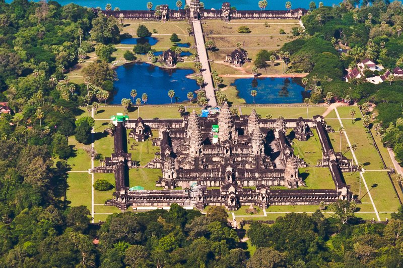 Aerial view of Angkor Wat temple complex surrounded by jungle and moat