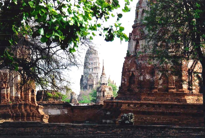 Ancient temple ruins of Ayutthaya reflected in surrounding water