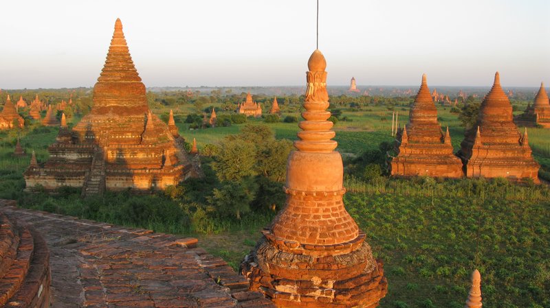 Ancient temples at sunset over the Bagan plain in Myanmar