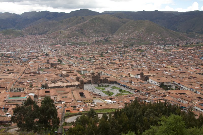 Panoramic view over the red-tiled rooftops of Cuzco in the Andes
