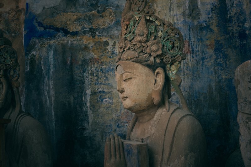 Carved and painted Buddhist figures in the cliff face at Baodingshan, Dazu