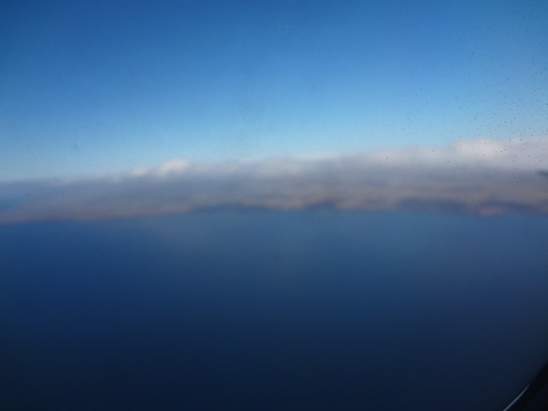 Aerial view of the Galápagos Islands' volcanic formations and blue waters