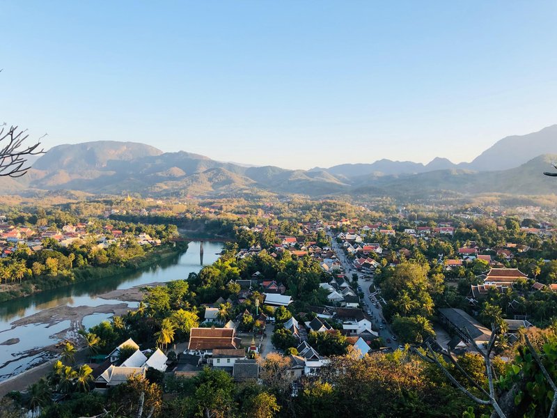Temple and monastery rooftops along the Mekong in Luang Prabang