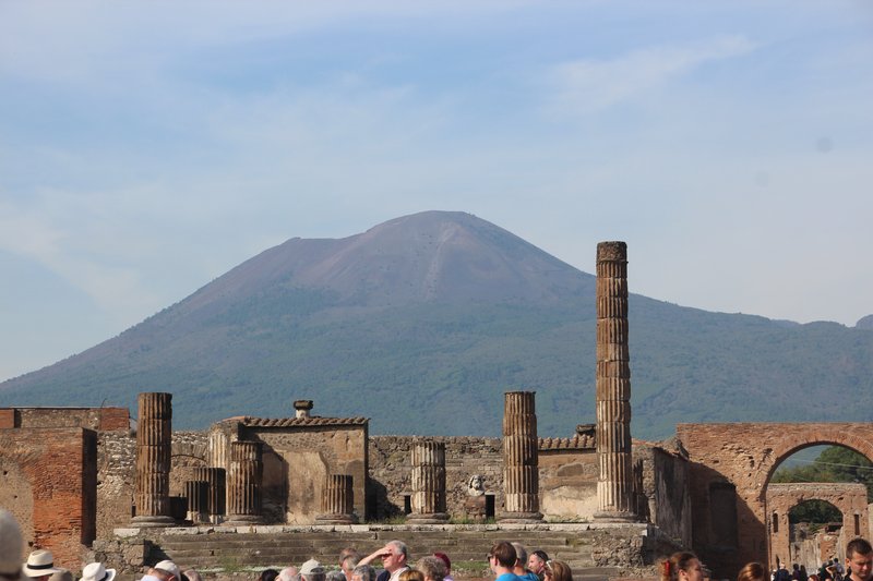 Pompeii forum ruins with Mount Vesuvius in the background