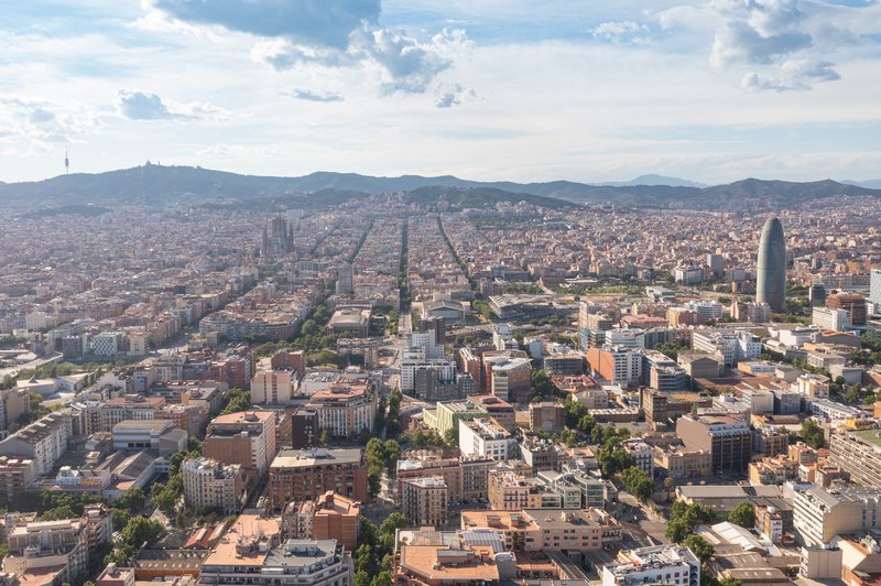 Aerial view of the Sagrada Família basilica amid Barcelona's grid