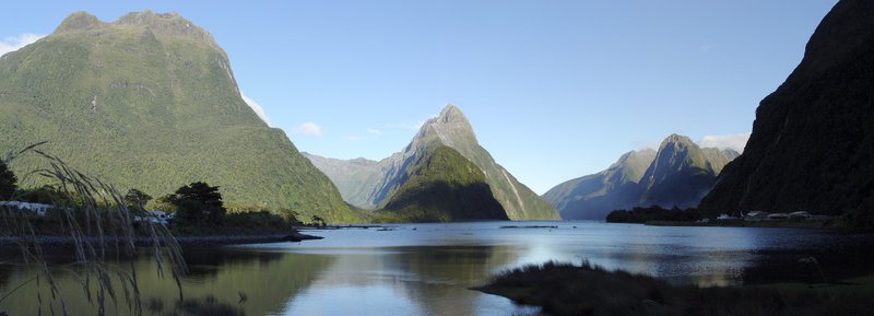 Milford Sound fiord with mirror-calm water and towering peaks