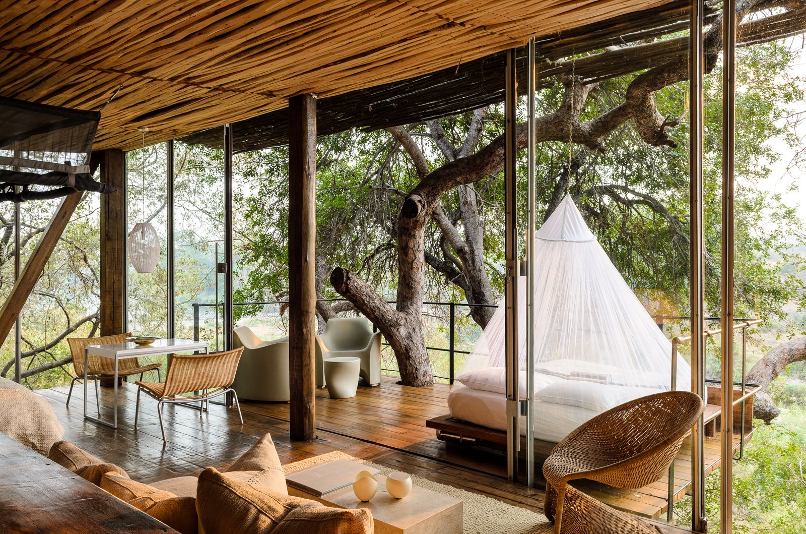 Singita Lebombo Lodge glass-walled loft suites cantilevered over the river in Kruger
