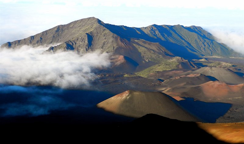 Haleakalā summit casting its shadow through clouds, Maui