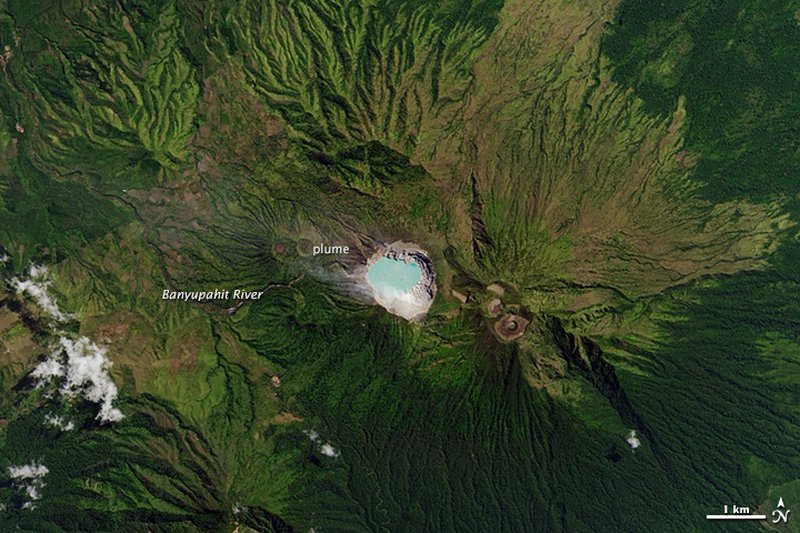 Turquoise acid crater lake inside Kawah Ijen volcano, East Java