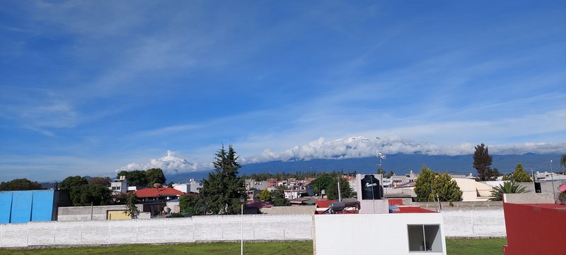 Popocatépetl and Iztaccíhuatl volcanoes rising above central Mexico