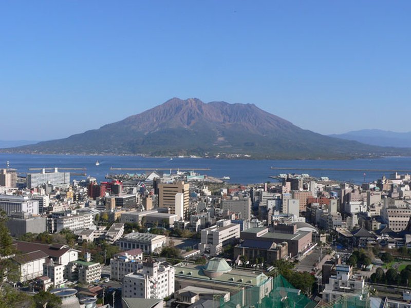 Sakurajima volcano rising from Kagoshima Bay, Japan