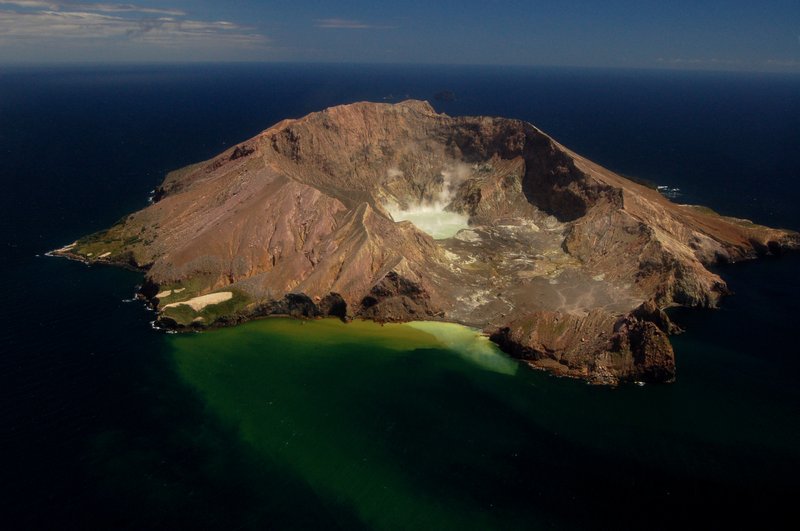 Whakaari/White Island volcano rising from the Bay of Plenty, New Zealand