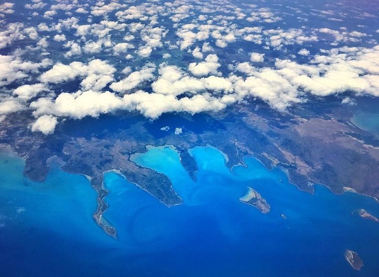 Aerial view of the Great Barrier Reef's coral formations in the Coral Sea, Queensland