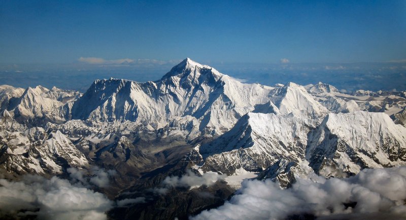Aerial view of Mount Everest and the surrounding Himalayan peaks from the south