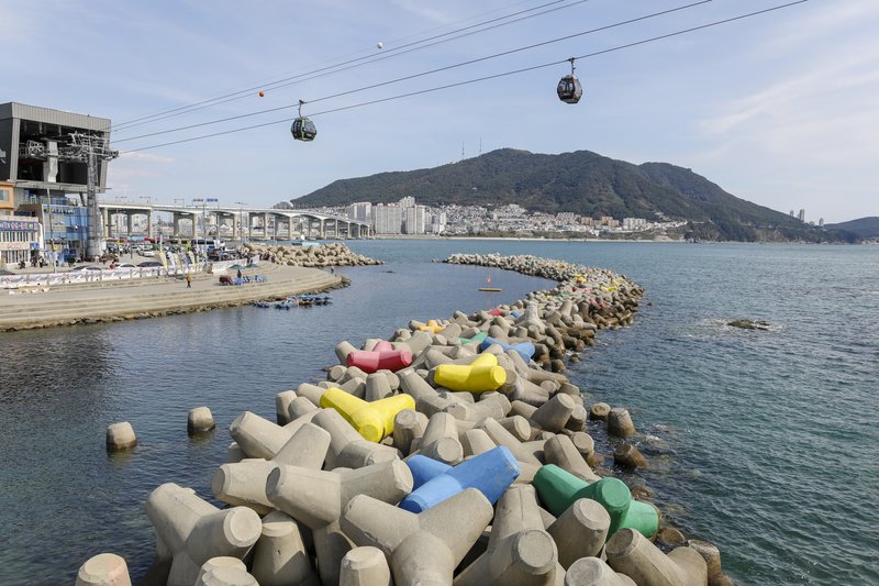 Songdo Sky Walk glass-panel walkway curving over the East Sea
