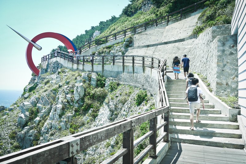Sea cliffs and forested coastal landscape at Taejongdae Park