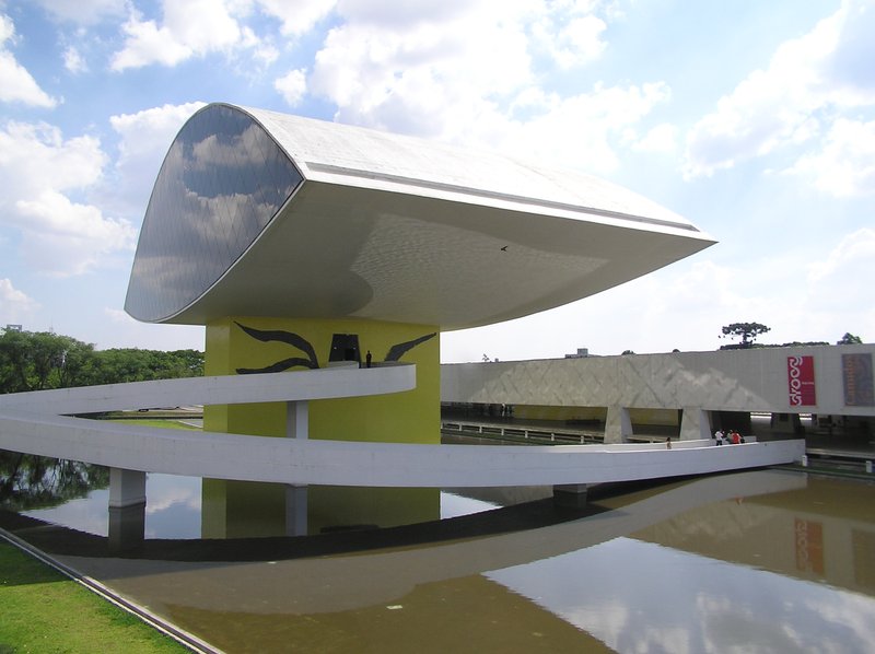 The Eye annex of Museu Oscar Niemeyer — a cantilevered ellipse on a curved concrete column