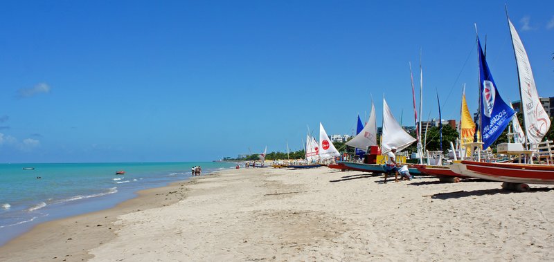 Jangada boats on the beach at Praia de Pajuçara, Maceió