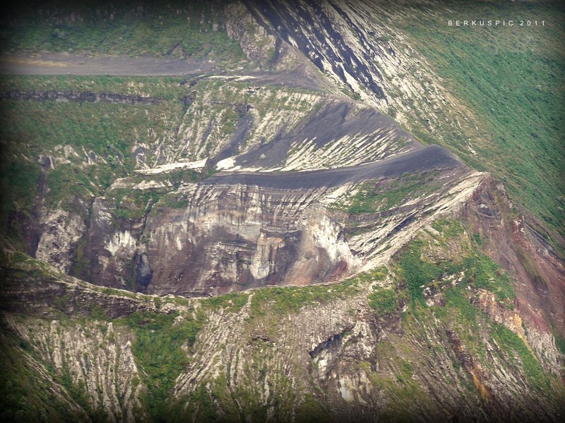 Irazú Volcano crater with green lake