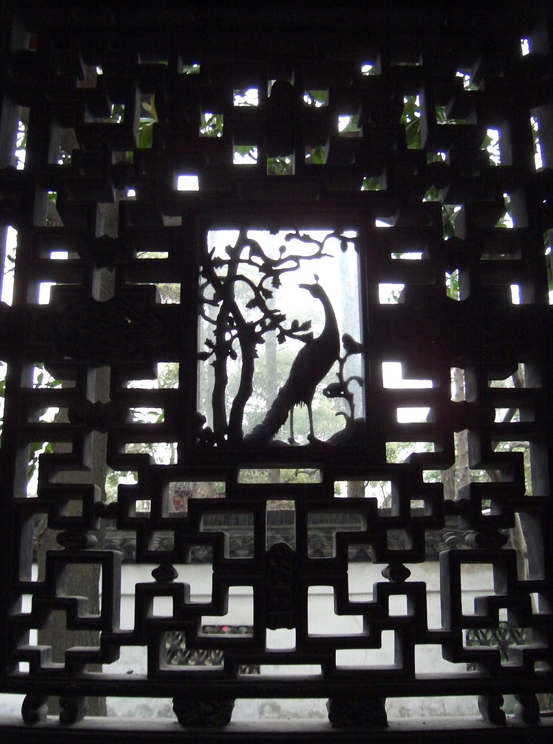 Yuyuan Garden classical pavilion reflected in lotus pond