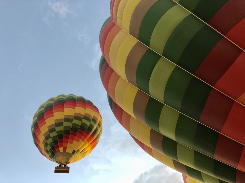 Hot air balloons over Luxor at sunrise