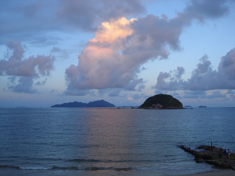 Sunset over the beach at Xichong